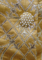 Evening jacket in gold brocade